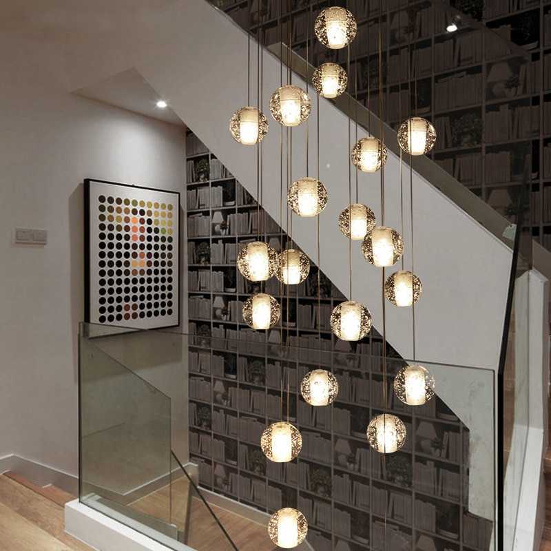 Каскадные люстры (53 фото): хрустальные модели-водопады с подвесками для высоких потолков и лестницы