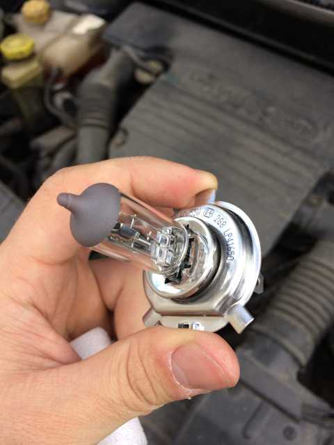 Как заменить лампочку переднего указателя поворота на моем ford fusion?