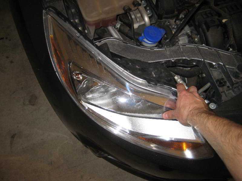 Как заменить лампочки в фарах форд фокус